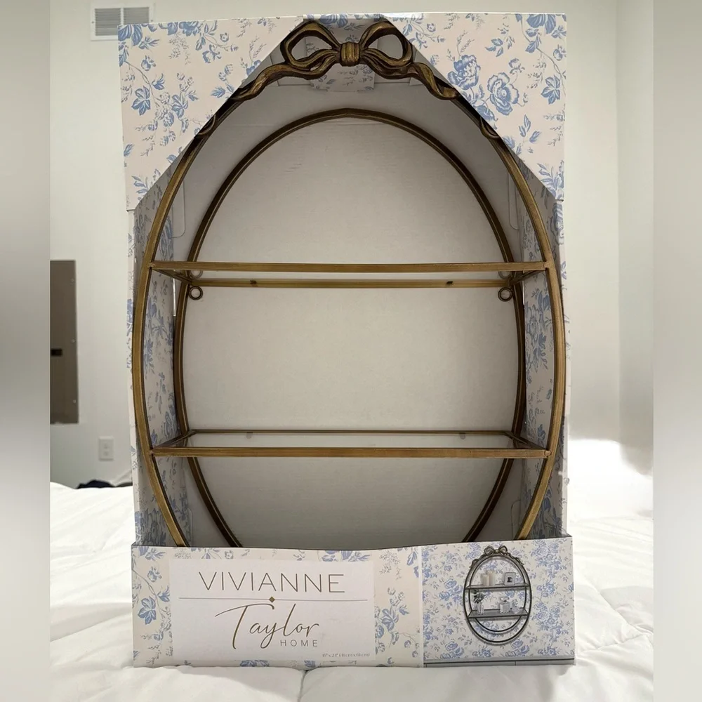 Vivianne Taylor Gold Oval Wall Shelf